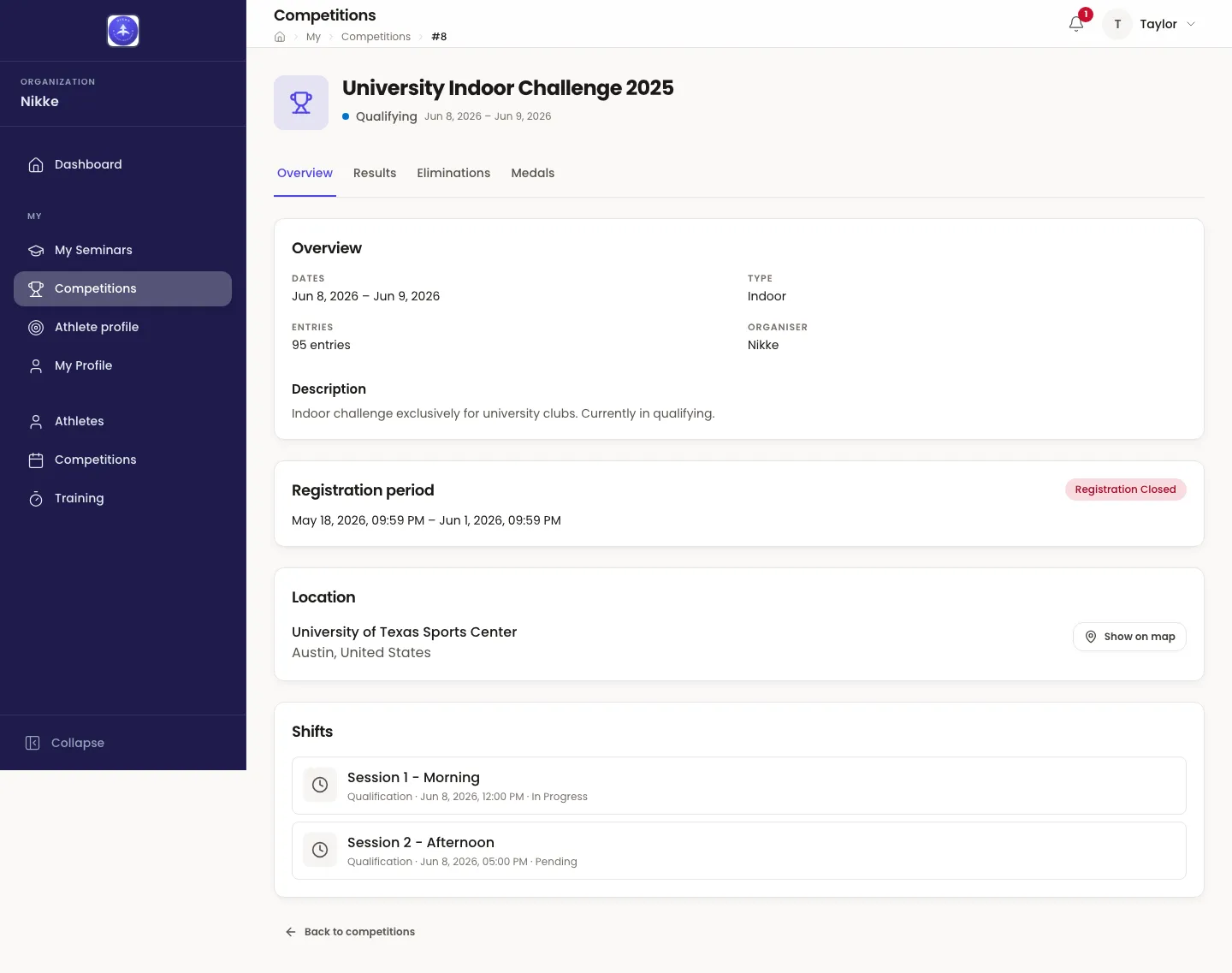 A competition opened from the My Competitions calendar, on its Overview tab. The heading University Indoor Challenge 2025 has a Qualifying badge and the dates Jun 8, 2026 – Jun 9, 2026 beneath it, then a tab row reading Overview, Results, Eliminations and Medals with Overview underlined. An Overview card gives Dates, Type Indoor, 95 entries, the Organiser Nikke and a one-line description. A Registration period card shows a Registration Closed badge with the window's dates. A Location card names the University of Texas Sports Center in Austin, United States, with a Show on map button. A Shifts card lists Session 1 - Morning and Session 2 - Afternoon, each marked Qualification with its date and time, the first In Progress and the second Pending. A Back to competitions link closes the page.