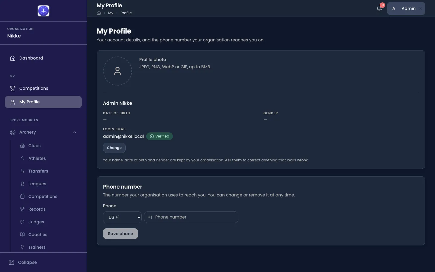 The My Profile page in Velos: a profile photo area, the person's name with date of birth and gender, the login email address marked Verified with a Change button, and a Phone number section with a country selector and a Save phone button.
