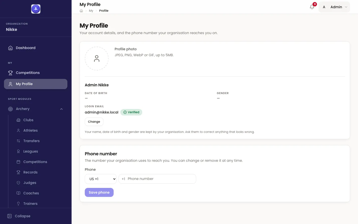 The My Profile page in Velos: a profile photo area, the person's name with date of birth and gender, the login email address marked Verified with a Change button, and a Phone number section with a country selector and a Save phone button.