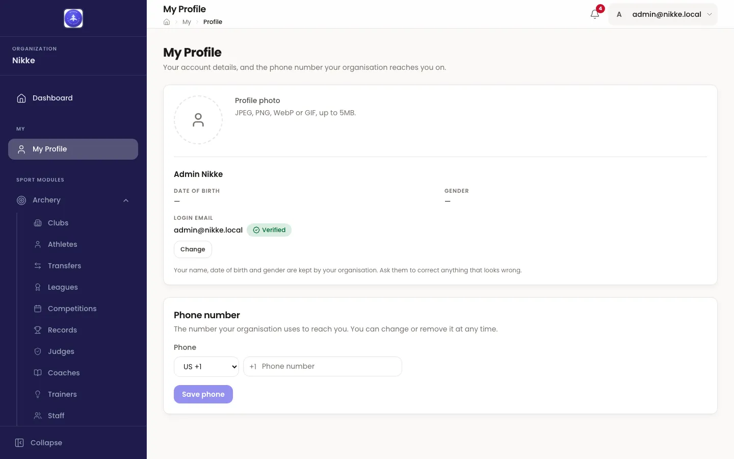 The My Profile page in Velos: a profile photo area, the person's name with date of birth and gender, the login email address marked Verified with a Change button, and a Phone number section with a country selector and a Save phone button.
