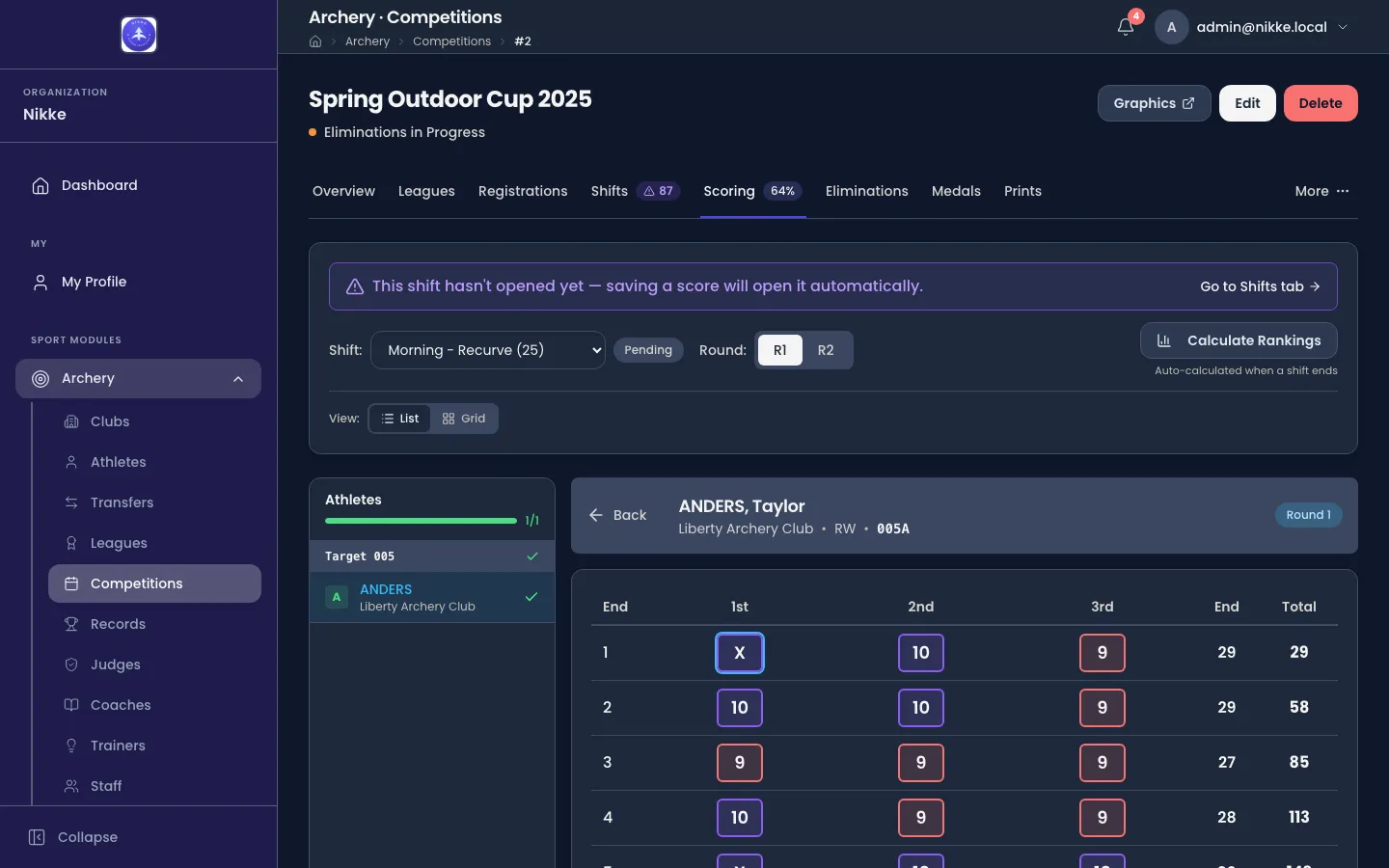 An archer's qualification card open in Velos. A header reads ANDERS, Taylor — Liberty Archery Club · RW · 005A — with a Round 1 badge. A table follows with a row per end and columns for the 1st, 2nd and 3rd arrow, the end total and the running total: end 1 is X, 10, 9 for 29 and 29; end 2 is 10, 10, 9 for 29 and 58; end 3 is 9, 9, 9 for 27 and 85.
