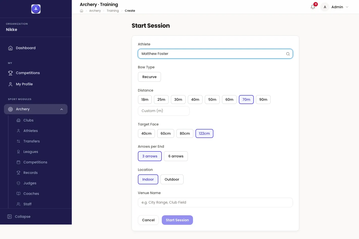 The Start Session form in Velos. A searchable Athlete box with a magnifier icon reads Matthew Foster; under it a Bow Type row with a single Recurve chip, a Distance row of chips from 18m to 90m with 70m selected and a Custom (m) box under it, a Target Face row with 122cm selected, an Arrows per End row with 3 arrows selected, a Location row with Indoor and Outdoor, and a Venue Name box. Cancel and Start Session buttons sit at the bottom.